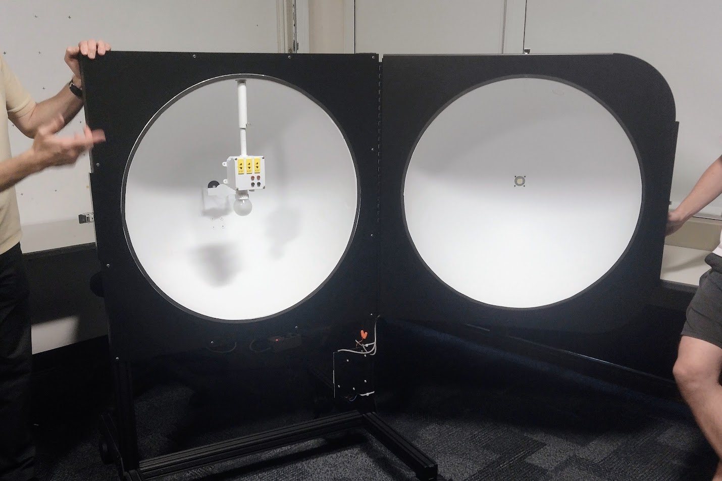 An integrating sphere being presented in class at the University of Colorado Boulder's Rocky Mountain Lighting Academy. Integrating spheres have several optical uses, including the measurement of a material's diffuse reflectance.